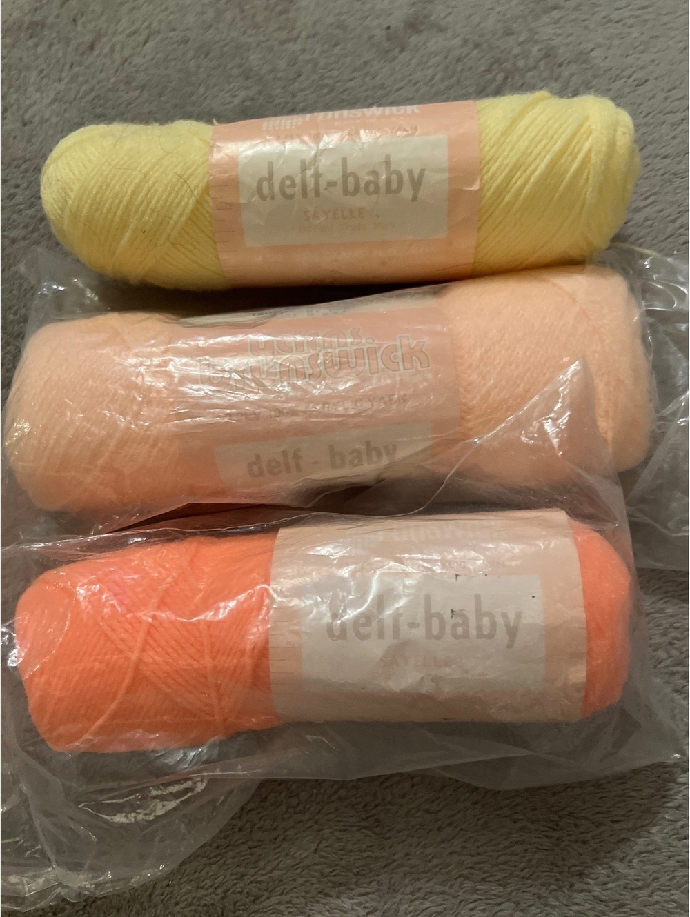 Set of 3 Deli-Baby Acrylic Yarn Skeins in Daffodil, Baby Peach, and Peach Glow